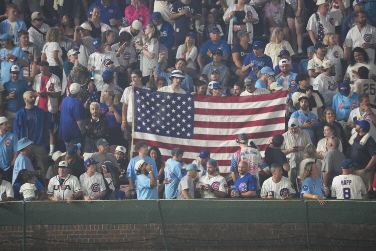 Cubs fans sing `Take Me Home, Country Roads' during fog delay at Wrigley Field